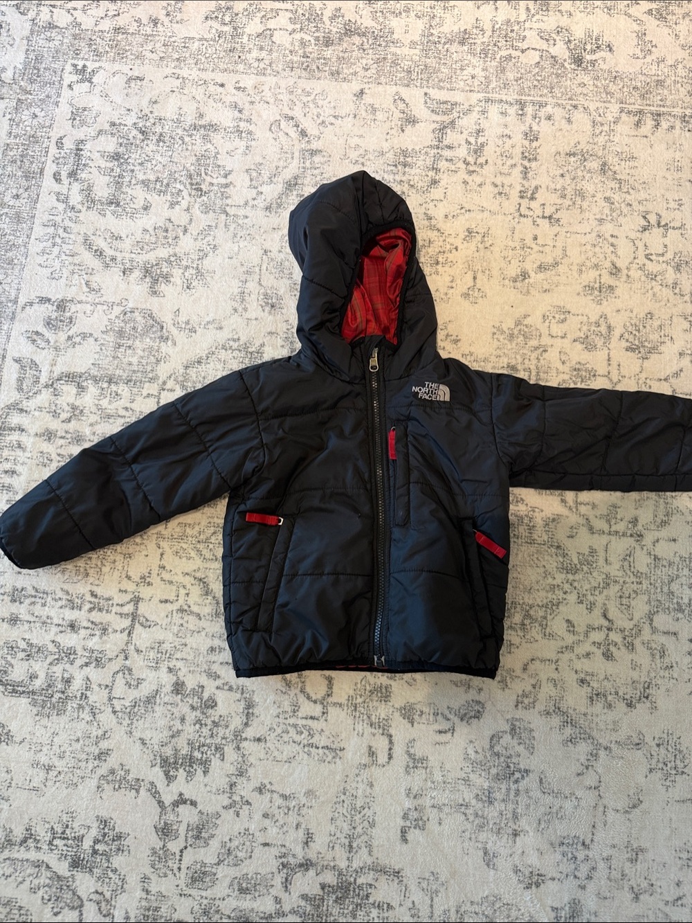 The North Face Kids Black Puffer Jacket with Red Accents